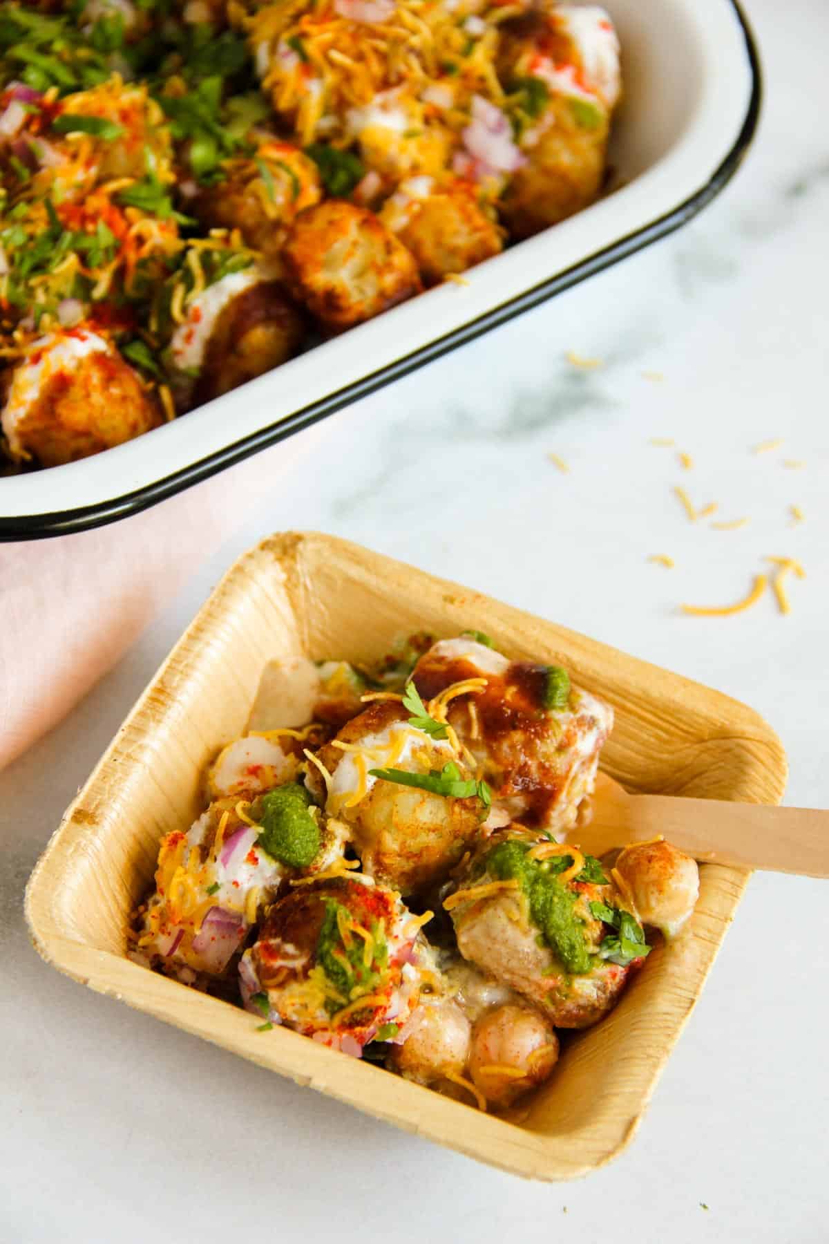 Tater Tots chaat served in an individual bowl 