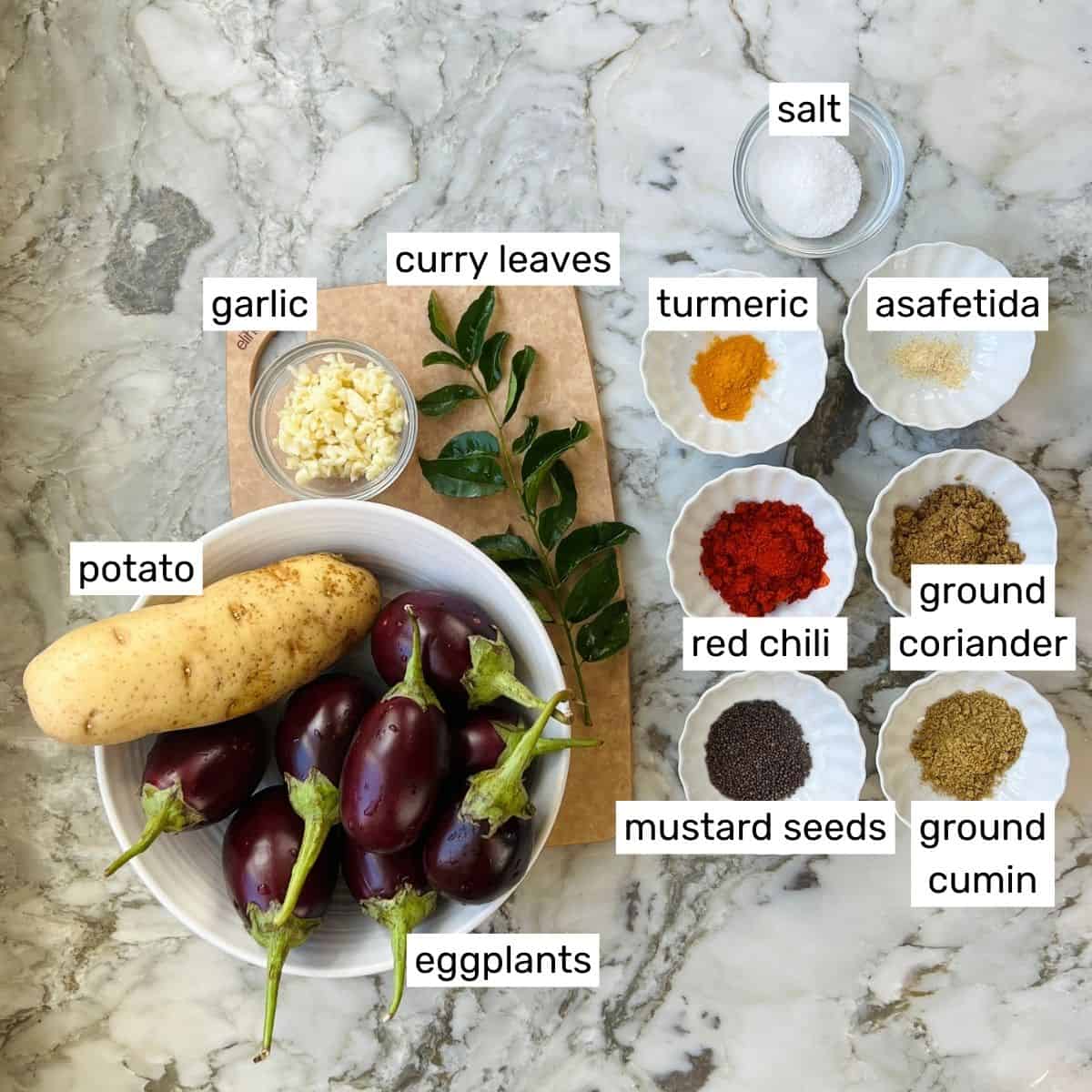 ingredients to make potato eggplant curry 
