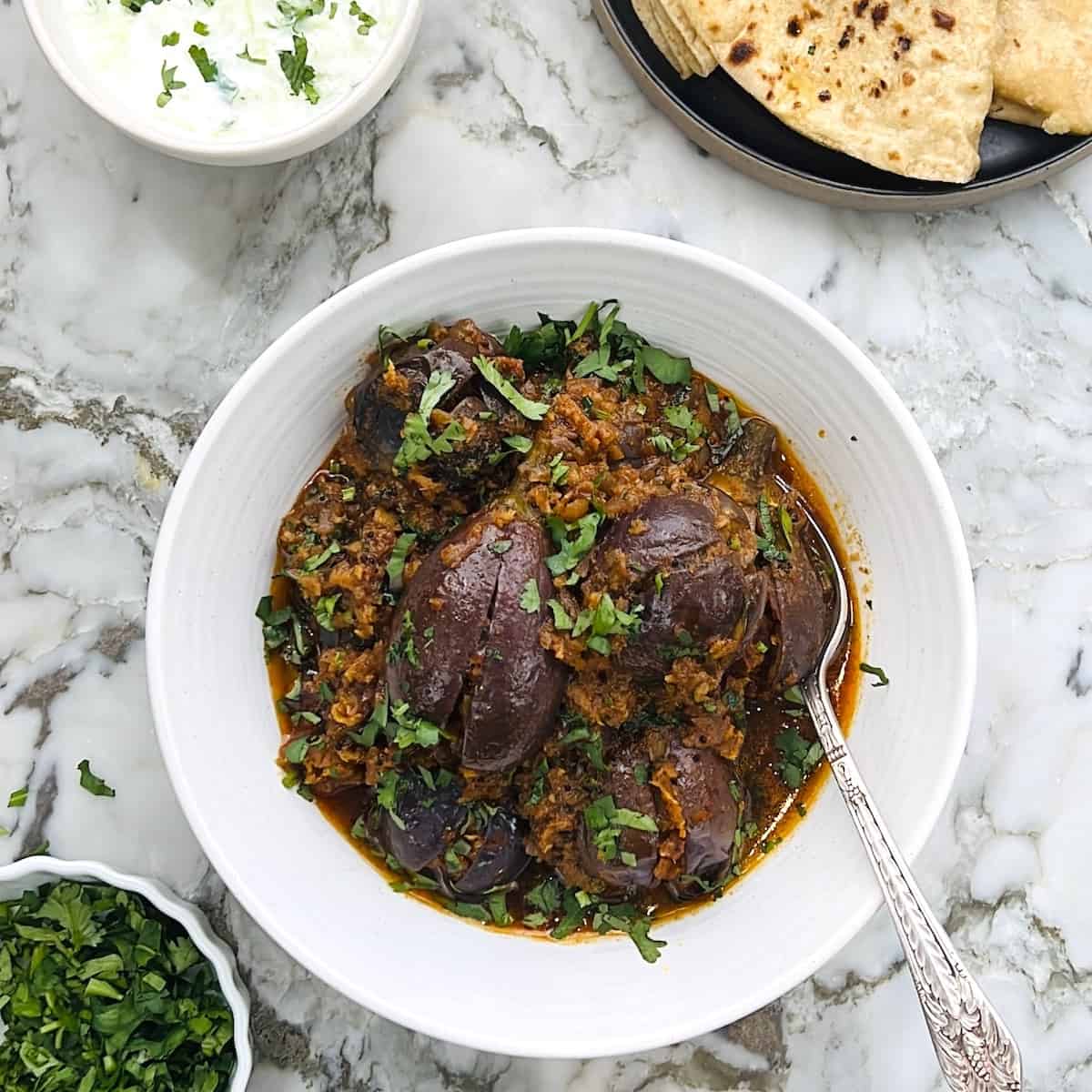 baingan masala served with roti