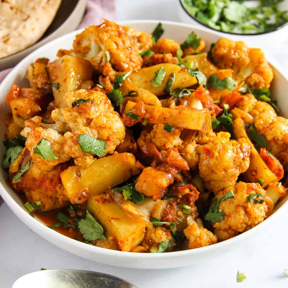 Aloo Gobi served in a white bowl