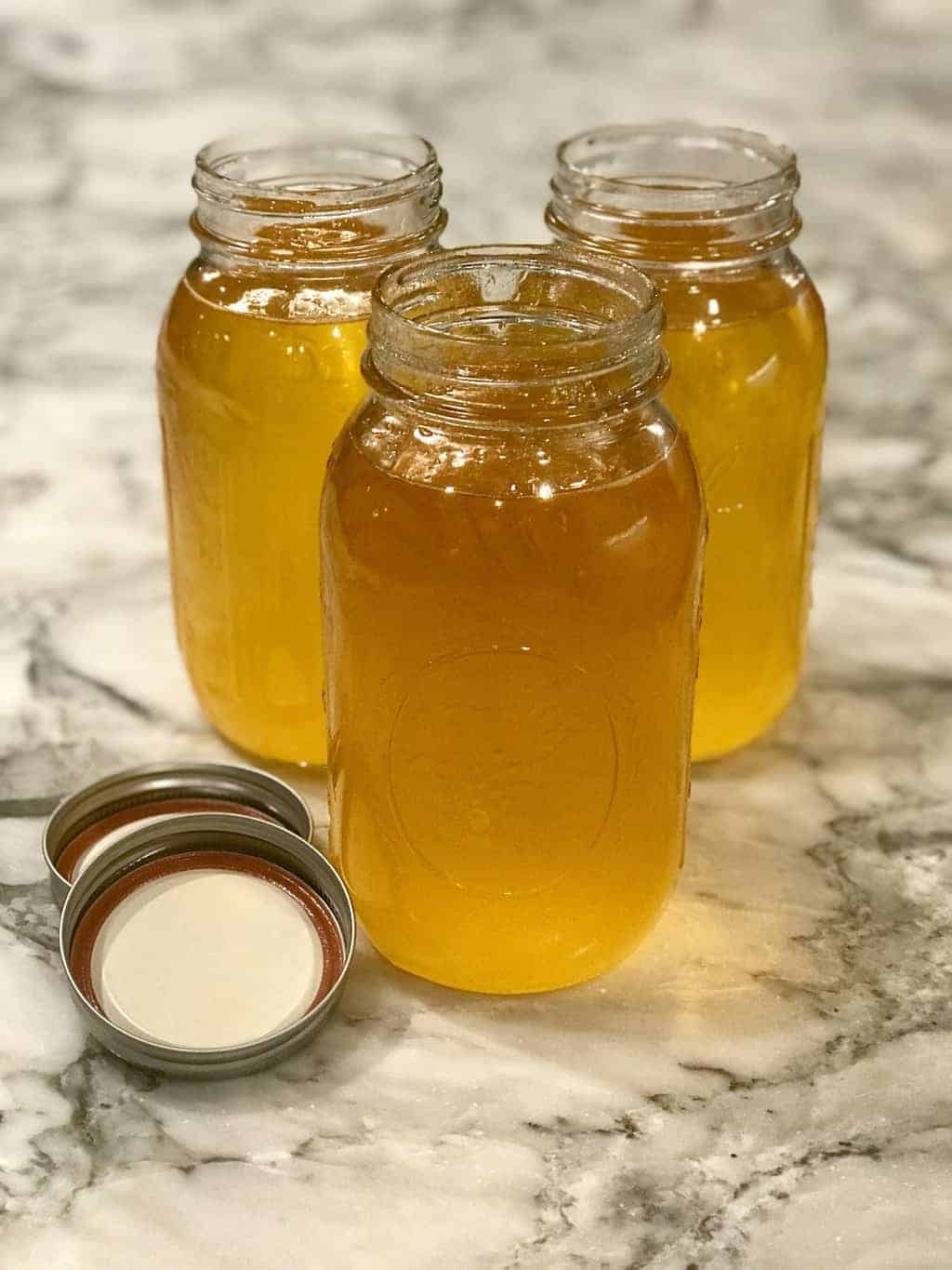 3 Mason jars filled with ghee