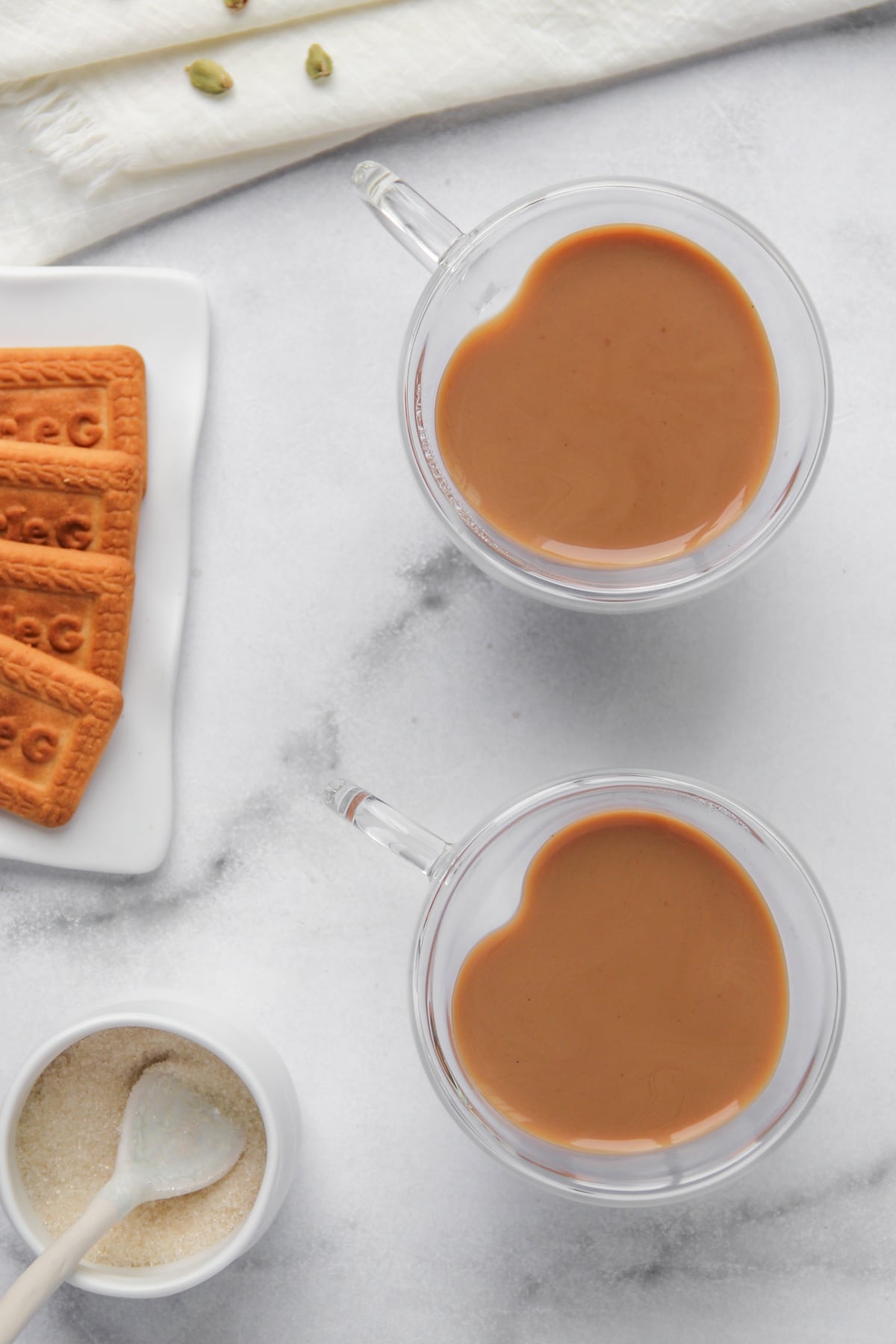 masala tea served with cookies 