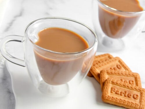 masala chai served with biscuits