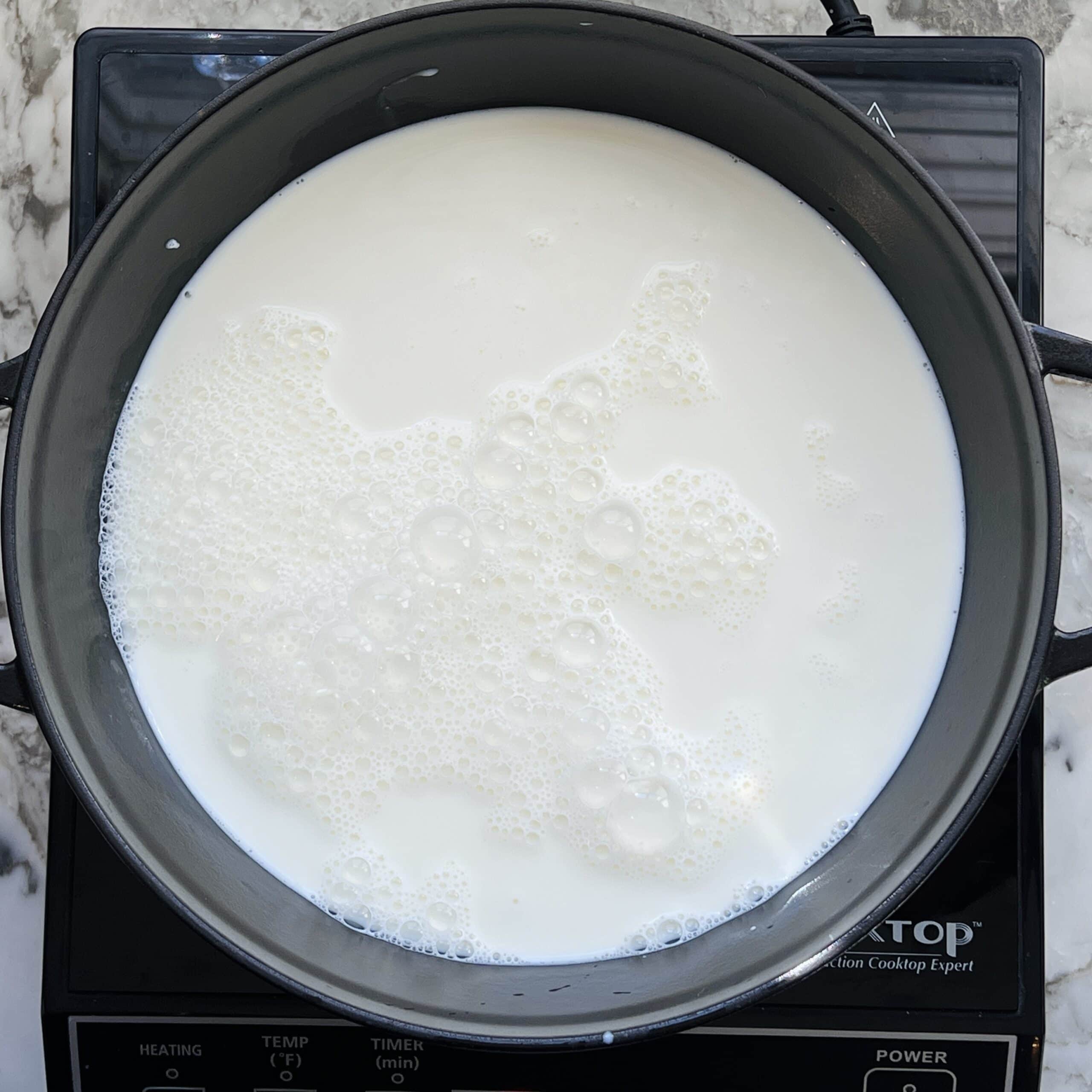 boiling milk in a pot